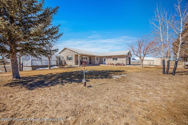 37 Pronghorn Rd, Craig, CO 81625 - view of front of property featuring stone siding