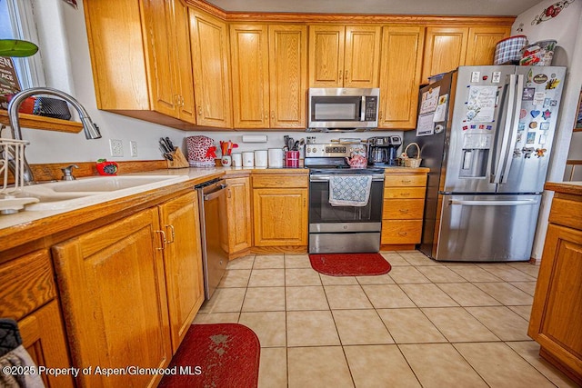 37 Pronghorn Rd, Craig, CO 81625 - kitchen with appliances with stainless steel finishes, light countertops, and brown cabinets