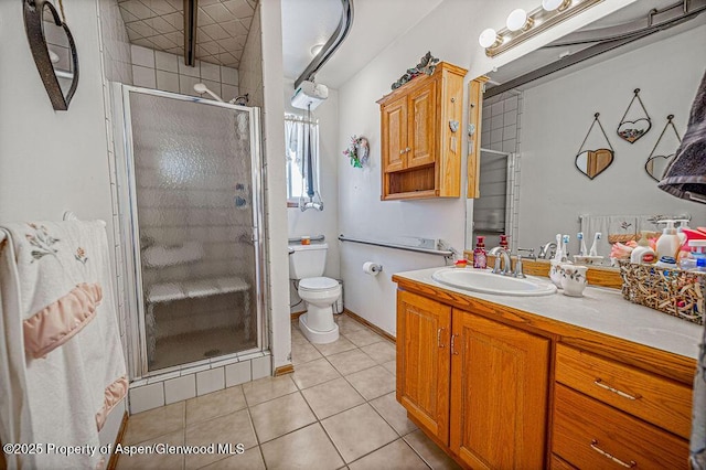 37 Pronghorn Rd, Craig, CO 81625 - bathroom with vanity, tile patterned flooring, and a stall shower