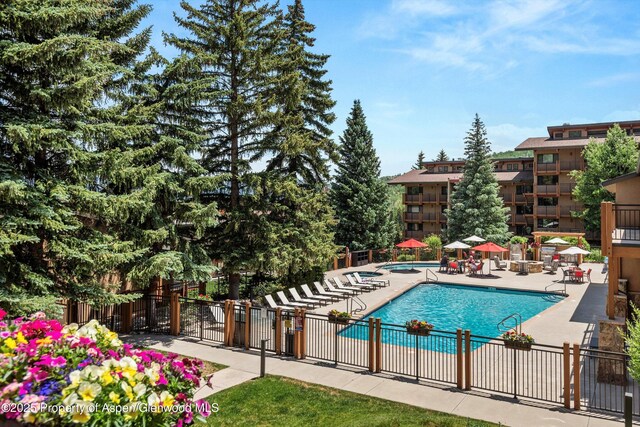 300 Carriage Way Unit 506, Snowmass Village, CO 81615 - community pool featuring a patio area