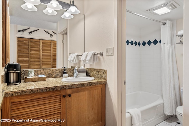 300 Carriage Way Unit 506, Snowmass Village, CO 81615 - bathroom featuring vanity, shower / bath combo, and tile patterned floors
