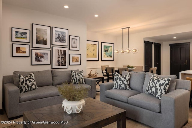 living room featuring a chandelier