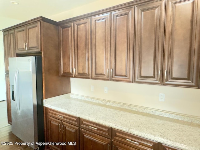 1279 E 17th St, Rifle, CO 81650 - kitchen with refrigerator with ice dispenser and light stone countertops