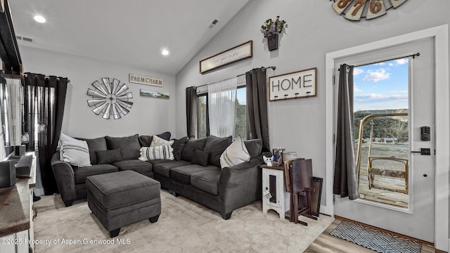 450 E 10th St, Rifle, CO 81650 - living area featuring recessed lighting, light wood-style floors, vaulted ceiling, and visible vents