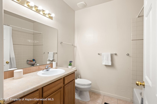 2701 Midland Ave Unit 725, Glenwood Springs, CO 81601 - bathroom featuring vanity, tile patterned flooring, and shower / bath combo with shower curtain