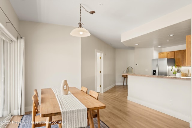 2701 Midland Ave Unit 725, Glenwood Springs, CO 81601 - dining area featuring light wood-style floors and recessed lighting