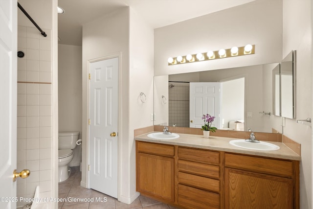 2701 Midland Ave Unit 725, Glenwood Springs, CO 81601 - bathroom with tile patterned flooring, double vanity, and a shower
