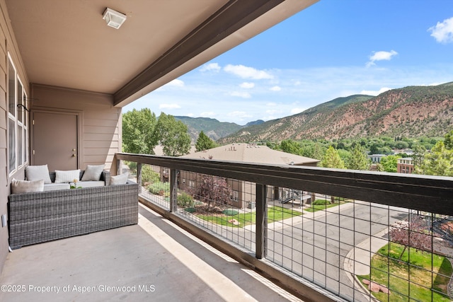 2701 Midland Ave Unit 725, Glenwood Springs, CO 81601 - balcony with a mountain view and an outdoor hangout area