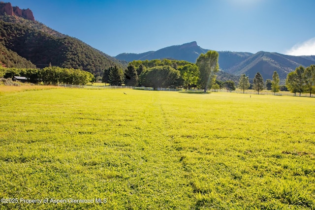 view of mountain feature with a rural view