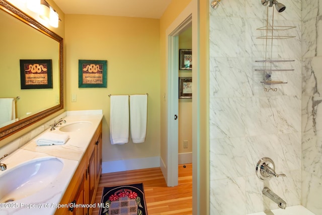 bathroom with vanity and wood-type flooring