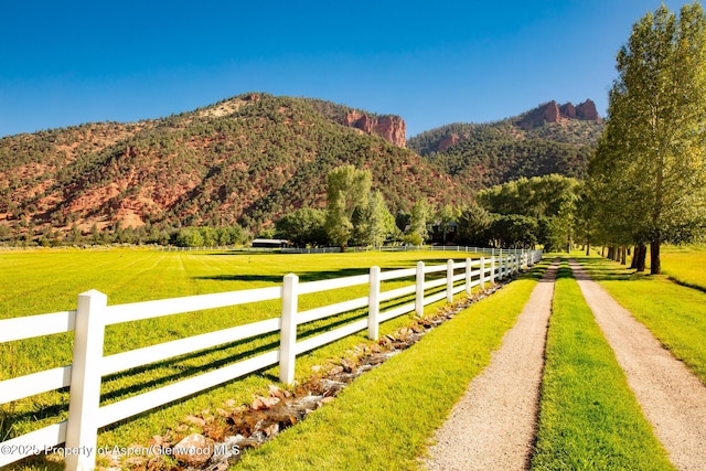 view of mountain feature with a rural view