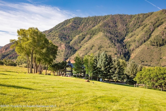 view of mountain feature featuring a rural view