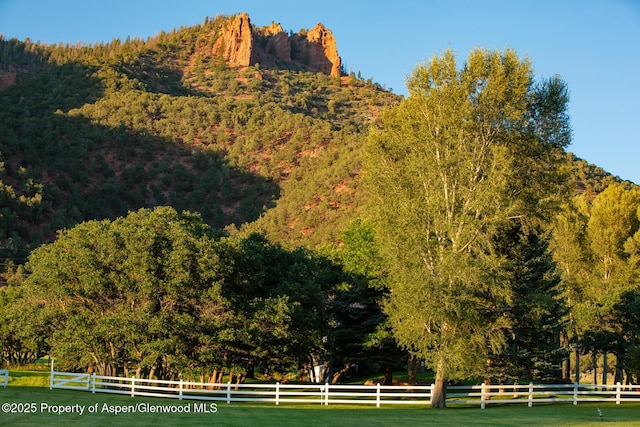 view of mountain feature with a rural view