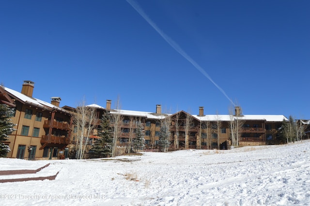 view of snow covered building