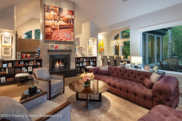 205 N 6th St, Aspen, CO 81611 - living room featuring healthy amount of natural light, a fireplace, and high vaulted ceiling