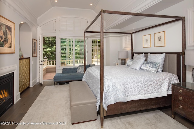 205 N 6th St, Aspen, CO 81611 - bedroom featuring wood finished floors, vaulted ceiling, a glass covered fireplace, ornamental molding, and recessed lighting