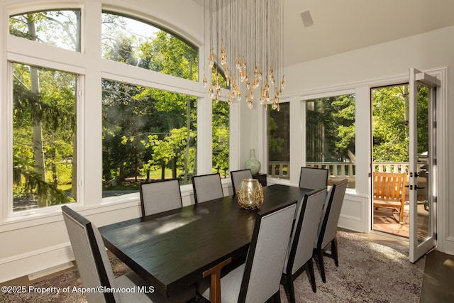 205 N 6th St, Aspen, CO 81611 - dining space with healthy amount of natural light and a chandelier