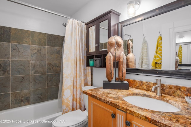 bathroom with toilet, shower / tub combo with curtain, and vanity