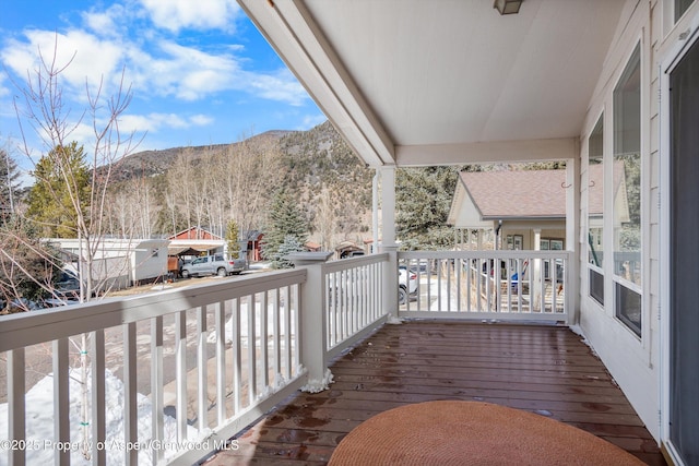 deck with a mountain view