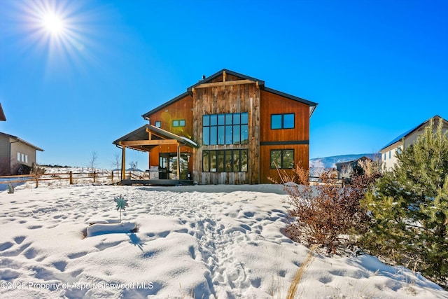 view of snow covered property