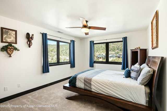 bedroom with carpet and ceiling fan