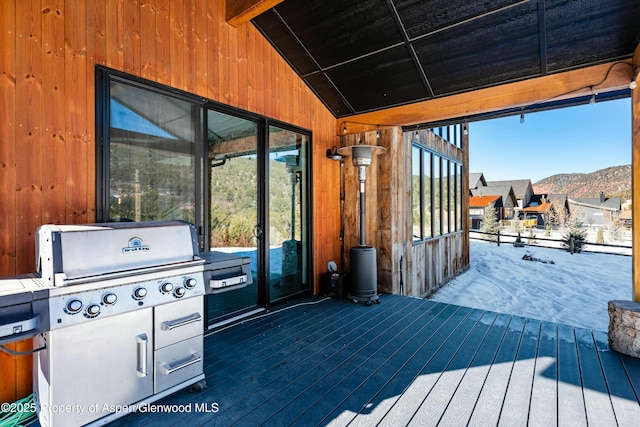 exterior space featuring a mountain view and vaulted ceiling