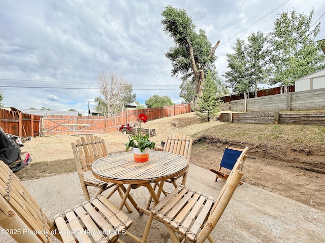 1111 Barclay St, Craig, CO 81625 - fenced backyard with a patio area