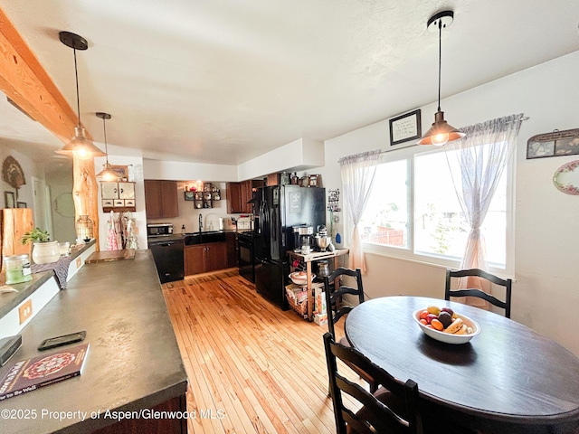 1111 Barclay St, Craig, CO 81625 - dining room featuring light wood-style flooring