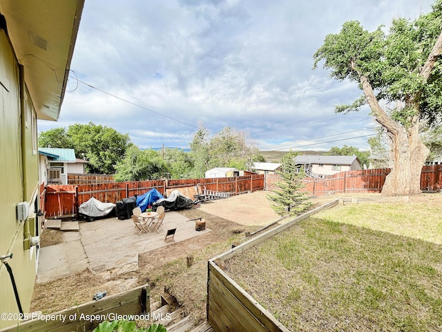1111 Barclay St, Craig, CO 81625 - fenced backyard featuring a patio area and a garden