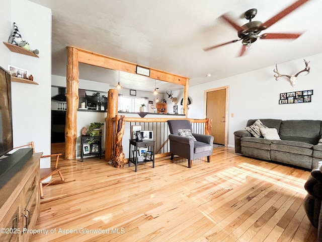 1111 Barclay St, Craig, CO 81625 - living area featuring a ceiling fan and wood-type flooring
