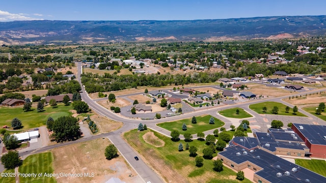 325 SE Cobblestone Ct, Cedaredge, CO 81413 - aerial view of a mountainous background