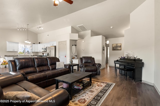 325 SE Cobblestone Ct, Cedaredge, CO 81413 - living room with high vaulted ceiling, ceiling fan, and dark wood finished floors