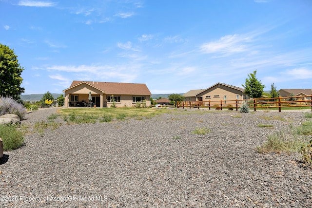 325 SE Cobblestone Ct, Cedaredge, CO 81413 - back of property with stucco siding