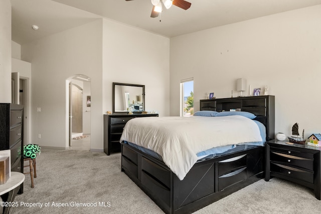 325 SE Cobblestone Ct, Cedaredge, CO 81413 - bedroom with arched walkways and light carpet