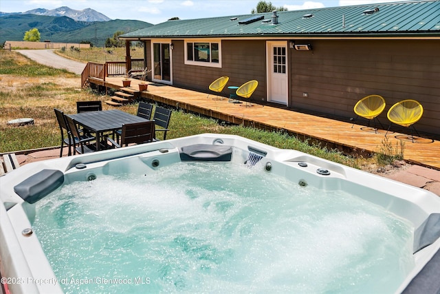 14 Fender Ln, Carbondale, CO 81623 - view of pool with a deck with mountain view, a hot tub, and outdoor dining space