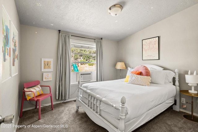 14 Fender Ln, Carbondale, CO 81623 - carpeted bedroom featuring a textured ceiling and baseboards