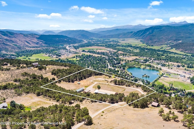 14 Fender Ln, Carbondale, CO 81623 - aerial overview of property's location with property boundaries highlighted and a water and mountain view