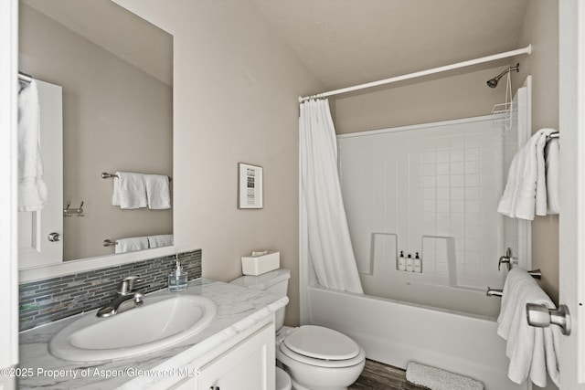 14 Fender Ln, Carbondale, CO 81623 - full bathroom featuring vanity, shower / bathtub combination with curtain, backsplash, and wood finished floors