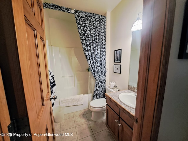 full bath featuring vanity, tile patterned flooring, toilet, and shower / tub combo with curtain