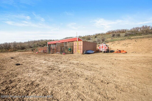 950 Highland Dr, Craig, CO 81625 - view of pole building with a rural view