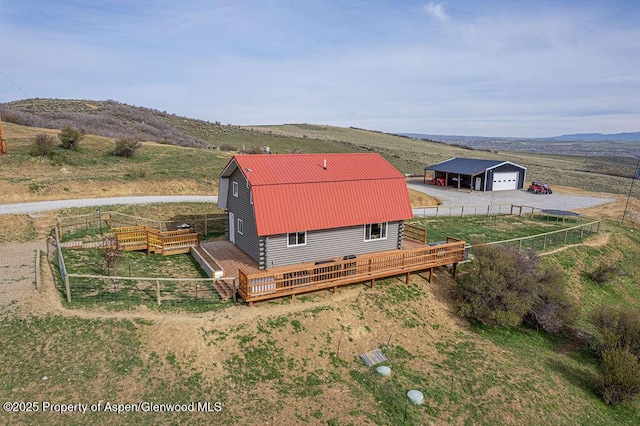 950 Highland Dr, Craig, CO 81625 - birds eye view of property featuring a mountain view and a rural view