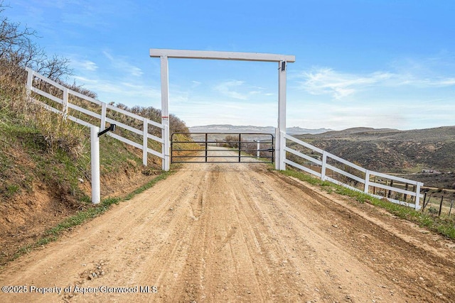 950 Highland Dr, Craig, CO 81625 - exterior space with a mountain view and fence