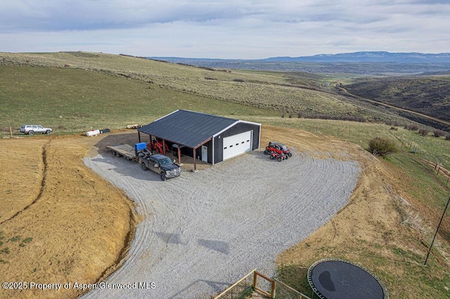 950 Highland Dr, Craig, CO 81625 - birds eye view of property featuring a rural view and a mountain view