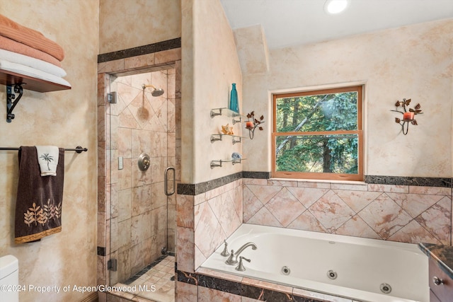 bathroom featuring plus walk in shower