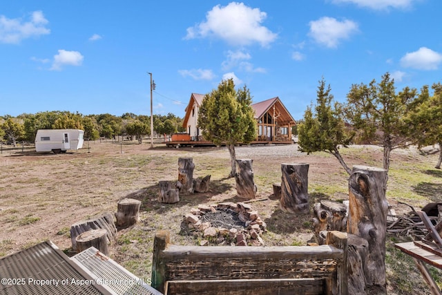 76 County Road 60b, Maybell, CO 81640 - view of yard with a wooden deck and an outbuilding