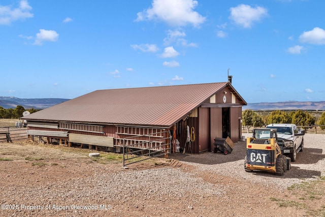 76 County Road 60b, Maybell, CO 81640 - exterior space featuring an exterior structure, an outbuilding, and a mountain view