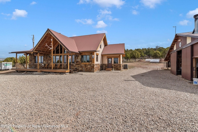 76 County Road 60b, Maybell, CO 81640 - back of house with metal roof and stone siding