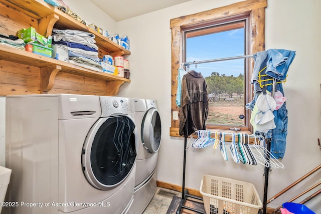 76 County Road 60b, Maybell, CO 81640 - clothes washing area with baseboards, washing machine and dryer, and laundry area