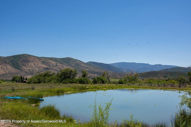 1150 Capitol Creek Rd, Snowmass, CO 81654 - water view featuring mountains