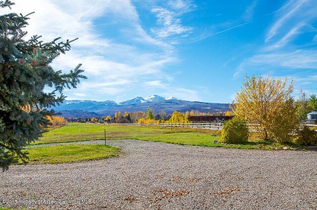 view of mountain feature with a rural view